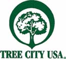 Logo of Tree City USA - drawing of tree with circle around it - with words Tree City USA below